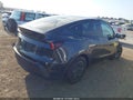 2026 Tesla Model Y — photo 4 of 18 | VIN 7SAYGDED1TA608102