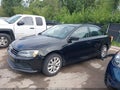 2015 Volkswagen Jetta — photo 2 of 16 | VIN 3VWD17AJ0FM283632
