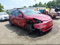 2024 Tesla Model Y — photo 1 of 17 | VIN 7SAYGDED3RF186555