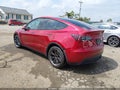 2024 Tesla Model Y — photo 3 of 17 | VIN 7SAYGDED3RF186555