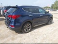 2017 Hyundai Santa Fe — photo 4 of 17 | VIN 5XYZWDLA3HG425087