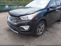 2015 Hyundai Santa Fe — photo 15 of 16 | VIN KM8SN4HF6FU129951