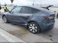 2022 Tesla Model Y — photo 3 of 19 | VIN 7SAYGDEE1NF427662