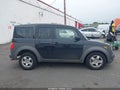 2003 Honda Element — photo 13 of 16 | VIN 5J6YH28563L018684