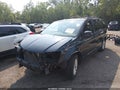 2014 Dodge Grand Caravan — photo 2 of 17 | VIN 2C4RDGCG8ER153641