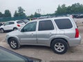 2005 Mazda Tribute — photo 14 of 16 | VIN 4F2CZ94155KM53830