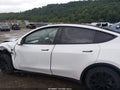 2022 Tesla Model Y — photo 12 of 14 | VIN 7SAYGAEE2NF328914
