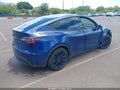 2021 Tesla Model Y — photo 4 of 20 | VIN 5YJYGAED7MF115900