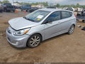 2014 Hyundai Accent — photo 2 of 17 | VIN KMHCU5AE1EU142443