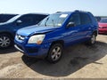 2009 Kia Sportage — photo 2 of 16 | VIN KNDJF724297609395