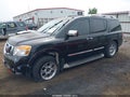 2011 Nissan Armada — photo 2 of 16 | VIN 5N1AA0NE3BN609963