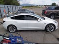 2018 Tesla Model 3 — photo 12 of 15 | VIN 5YJ3E1EA1JF052424