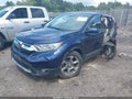 2018 Honda CR-V — photo 2 of 17 | VIN 7FARW1H81JE009125