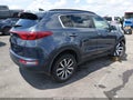 2018 Kia Sportage — photo 4 of 16 | VIN KNDPNCAC5J7482015
