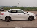 2019 Kia Optima — photo 13 of 16 | VIN 5XXGT4L34KG359789