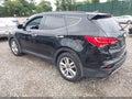 2015 Hyundai Santa Fe — photo 3 of 17 | VIN 5XYZWDLA5FG256865