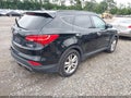 2015 Hyundai Santa Fe — photo 4 of 17 | VIN 5XYZWDLA5FG256865