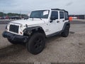 2011 Jeep Wrangler Unlimited — photo 2 of 16 | VIN 1J4BA3H19BL537644