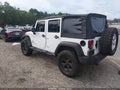 2011 Jeep Wrangler Unlimited — photo 3 of 16 | VIN 1J4BA3H19BL537644