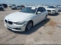 2014 BMW 3 Series — photo 2 of 13 | VIN WBA3C1C52EK105777
