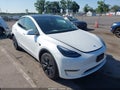 2024 Tesla Model Y — photo 1 of 18 | VIN 7SAYGDEE9RF152273