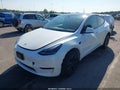 2024 Tesla Model Y — photo 2 of 18 | VIN 7SAYGDEE9RF152273