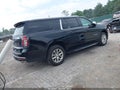 2023 Chevrolet Suburban — photo 4 of 16 | VIN 1GNSCFKD6PR342438