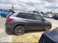 2021 Honda Passport — photo 12 of 15 | VIN 5FNYF8H57MB039563