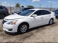 2015 Nissan Altima — photo 2 of 16 | VIN 1N4AL3AP1FC106706