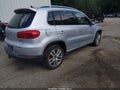 2014 Volkswagen Tiguan — photo 4 of 11 | VIN WVGBV3AX0EW014147