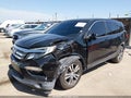 2016 Honda Pilot — photo 2 of 17 | VIN 5FNYF6H5XGB123126