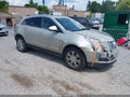 2015 Cadillac SRX — photo 1 of 16 | VIN 3GYFNEE38FS555592