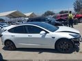 2021 Tesla Model 3 — photo 14 of 22 | VIN 5YJ3E1EB2MF938975