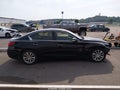 2015 Infiniti Q50 — photo 14 of 17 | VIN JN1BV7AR2FM416331