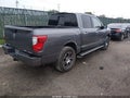 2020 Nissan Titan — photo 4 of 17 | VIN 1N6AA1ED9LN509141