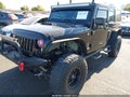 2015 Jeep Wrangler Unlimited — photo 2 of 20 | VIN 1C4HJWDGXFL618850