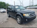 2009 Ford Escape — photo 1 of 12 | VIN 1FMCU93G69KA12049