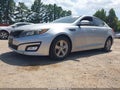 2015 Kia Optima — photo 2 of 13 | VIN 5XXGM4A75FG427722
