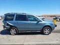 2008 Honda Pilot — photo 14 of 17 | VIN 5FNYF18798B028756
