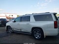 2016 Chevrolet Suburban — photo 14 of 16 | VIN 1GNSKJKC9GR161976