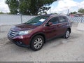 2012 Honda CR-V — photo 2 of 16 | VIN 5J6RM3H70CL014508