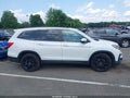 2022 Honda Pilot — photo 13 of 16 | VIN 5FNYF6H26NB079385