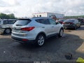 2016 Hyundai Santa Fe — photo 4 of 16 | VIN 5XYZWDLA7GG354149