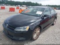 2013 Volkswagen Jetta — photo 2 of 11 | VIN 3VWLL7AJ8DM377051
