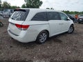 2016 Honda Odyssey — photo 4 of 15 | VIN 5FNRL5H61GB157374