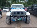 2012 Jeep Wrangler Unlimited — photo 12 of 16 | VIN 1C4HJWEG5CL152786