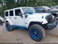 2012 Jeep Wrangler Unlimited — photo 13 of 16 | VIN 1C4HJWEG5CL152786