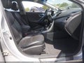 2014 Hyundai Elantra — photo 5 of 16 | VIN 5NPDH4AEXEH477704