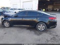 2016 Kia Optima — photo 14 of 15 | VIN 5XXGT4L34GG094184