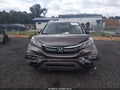 2016 Honda CR-V — photo 13 of 17 | VIN 2HKRM3H74GH559577